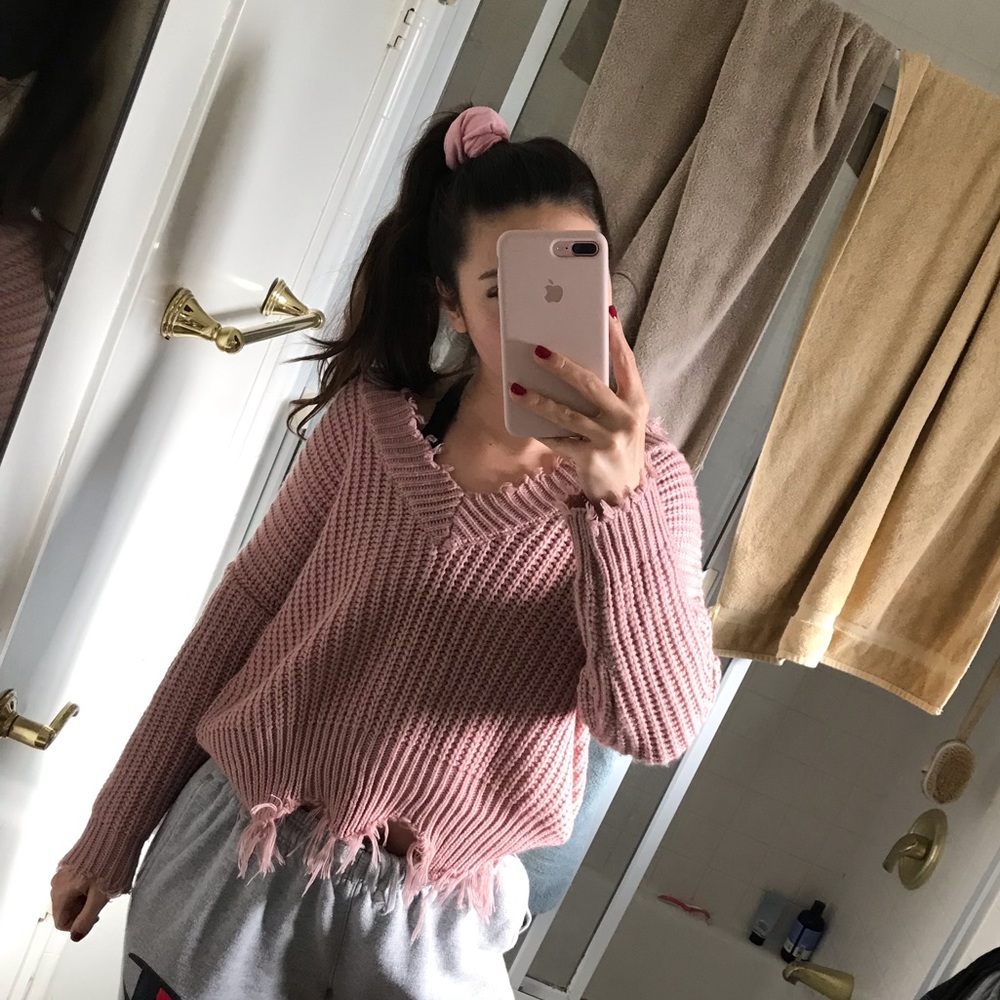 cozy distressed pink sweater